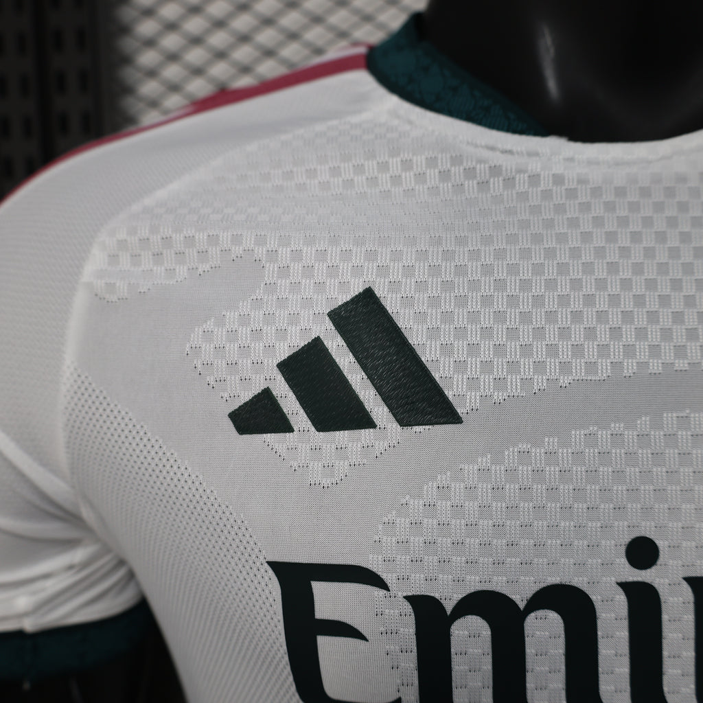White football jersey back close-up with adidas logo and large “Emirates” print