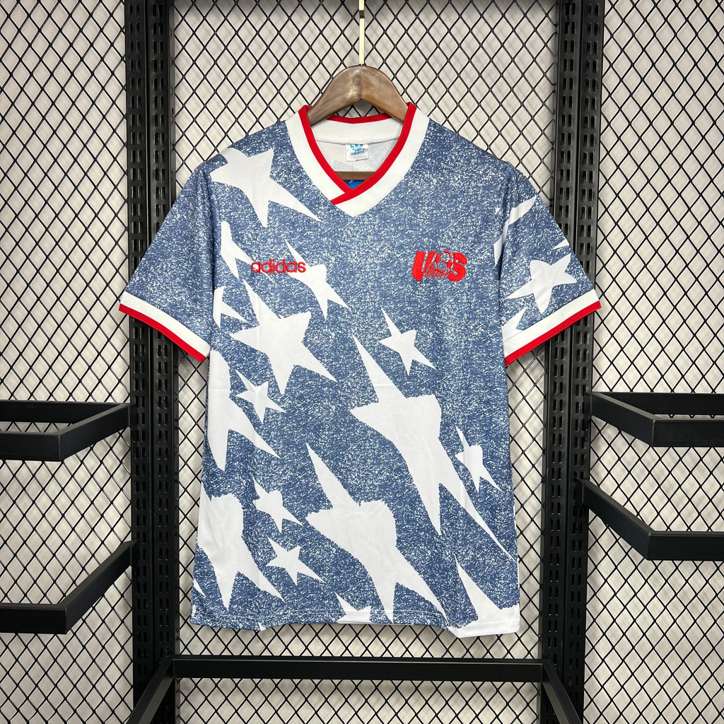 USA 1994 away jersey in blue with white star graphic, red collar and sleeve trim