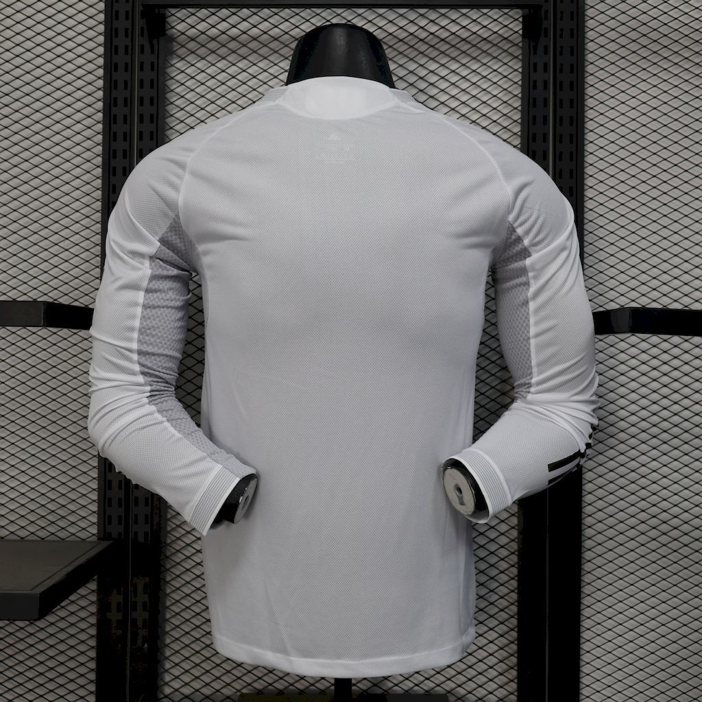 Real Madrid home jersey, white long-sleeve with yellow piping; back view