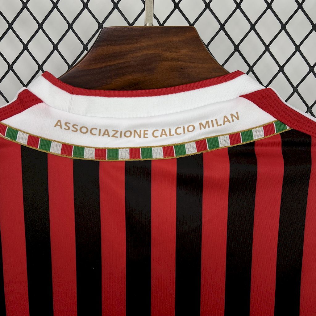 Jersey collar with Associazione Calcio Milan band above red-and-black stripes