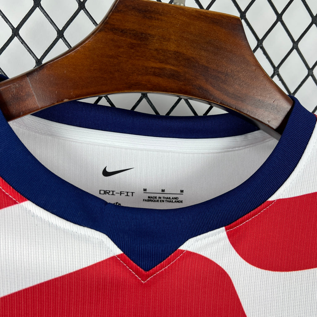 USA soccer jersey neckline with blue rib collar and Dri-FIT fabric label