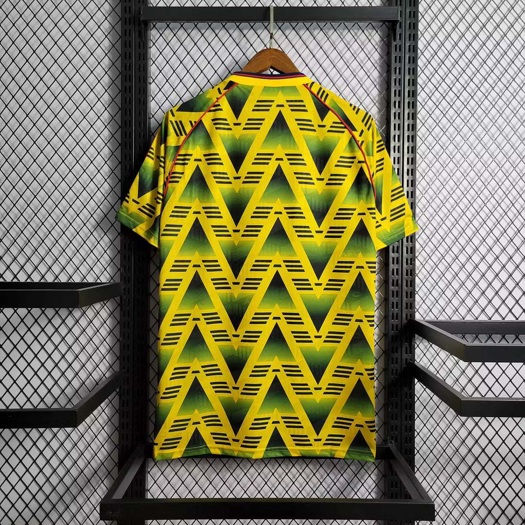 Retro football jersey back, yellow-green zigzag print with red collar and sleeve stripes