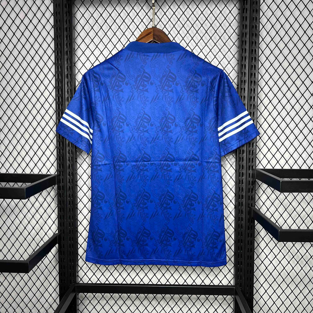 Blue home retro football shirt back view, white sleeve stripes, Adidas logo at collar