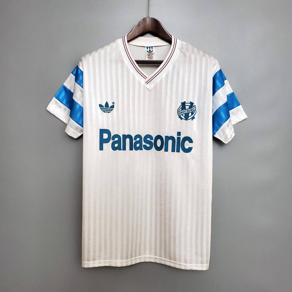 Home soccer jersey, white with blue diagonal sleeve stripes and V-neck trim