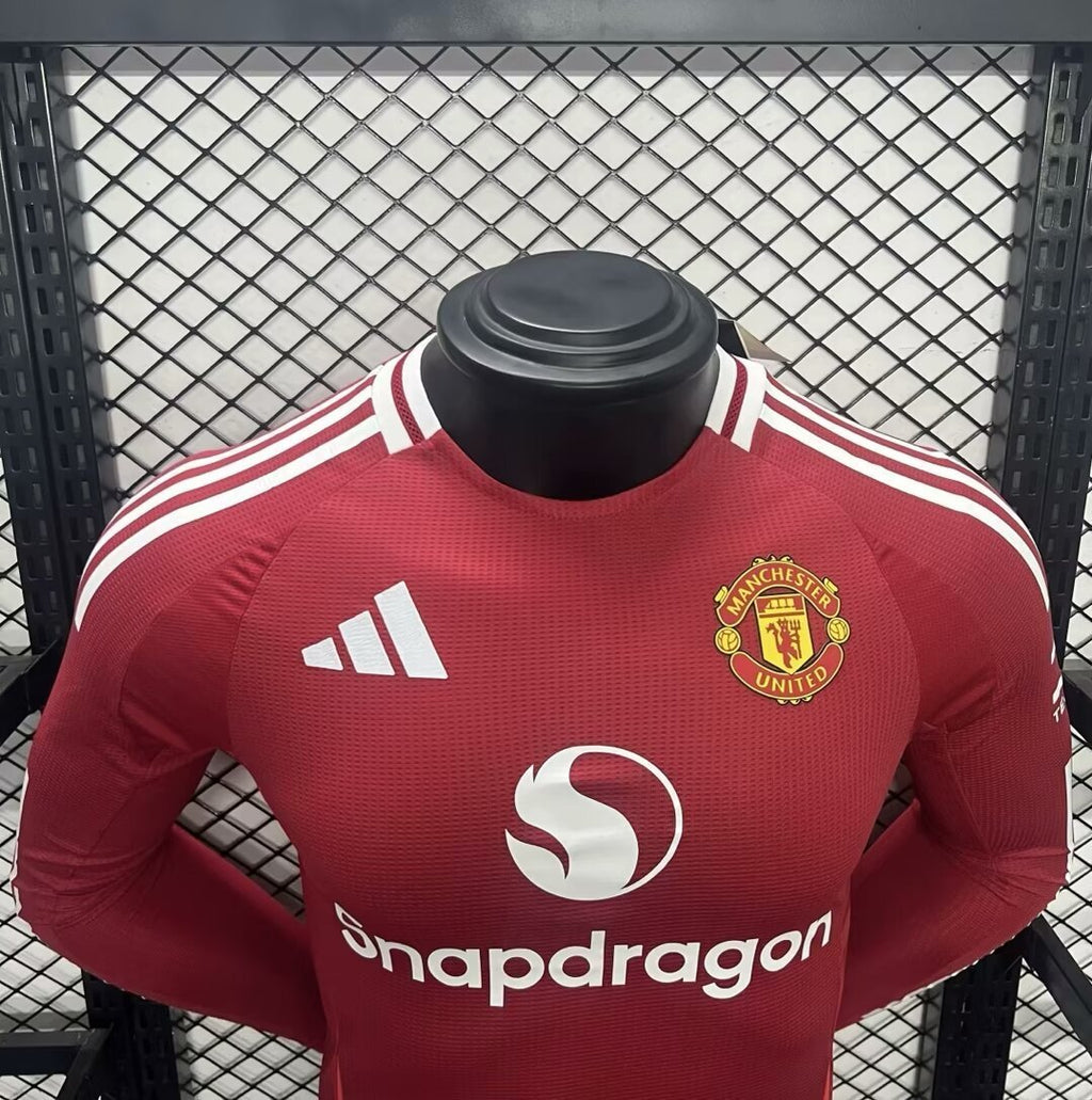 Home long-sleeve jersey front close-up, maroon, club crest and Snapdragon sponsor