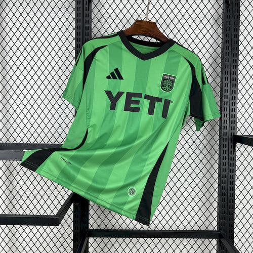 Austin FC green home fan soccer jersey with black trim, YETI sponsor, and crest logo