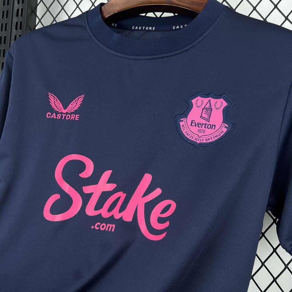 Navy Everton fourth fan football jersey close-up with Castore logo and Everton crest