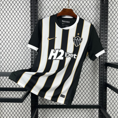 Atletico Mineiro home soccer jersey, black and white vertical stripes with gold trim