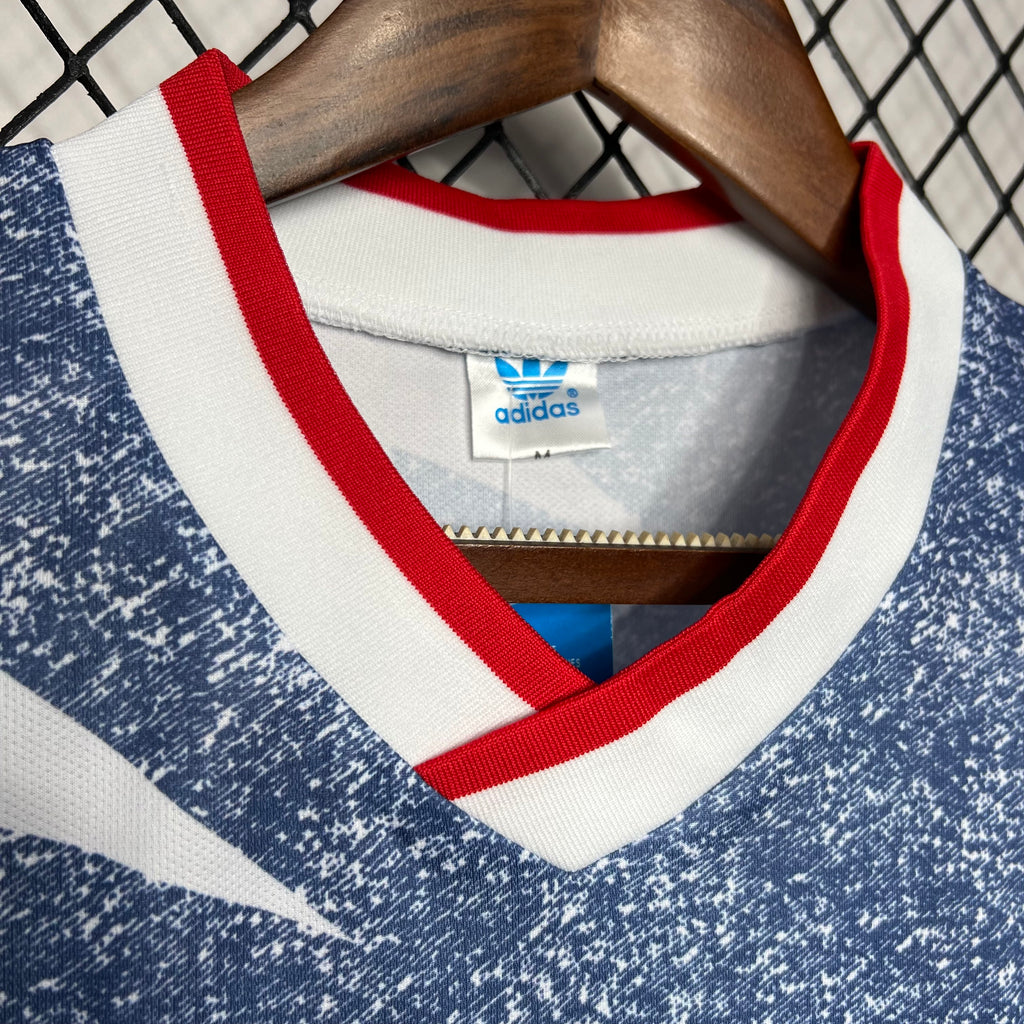 USA 1994 away jersey neckline with blue jersey, white/red striped trim and adidas tag