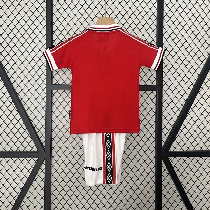 Red kids soccer jersey and shorts set, white-trim collar and striped cuffs