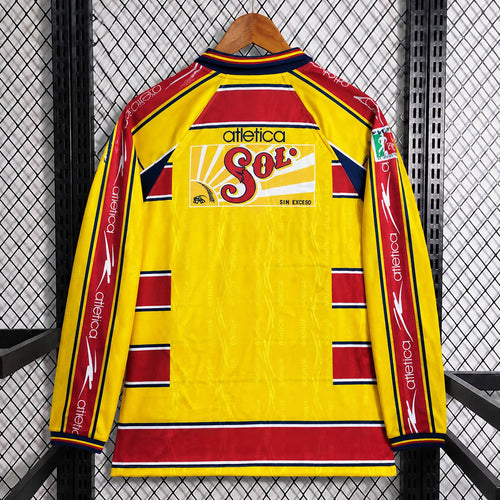 Yellow long-sleeve soccer jersey with red-and-blue shoulder stripes and '302' crest