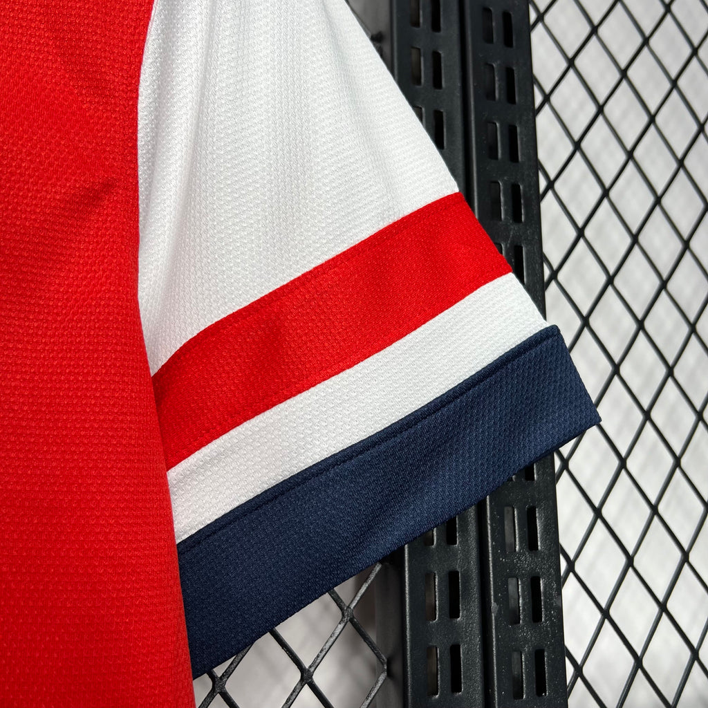Red jersey sleeve with white and navy contrast stripe band