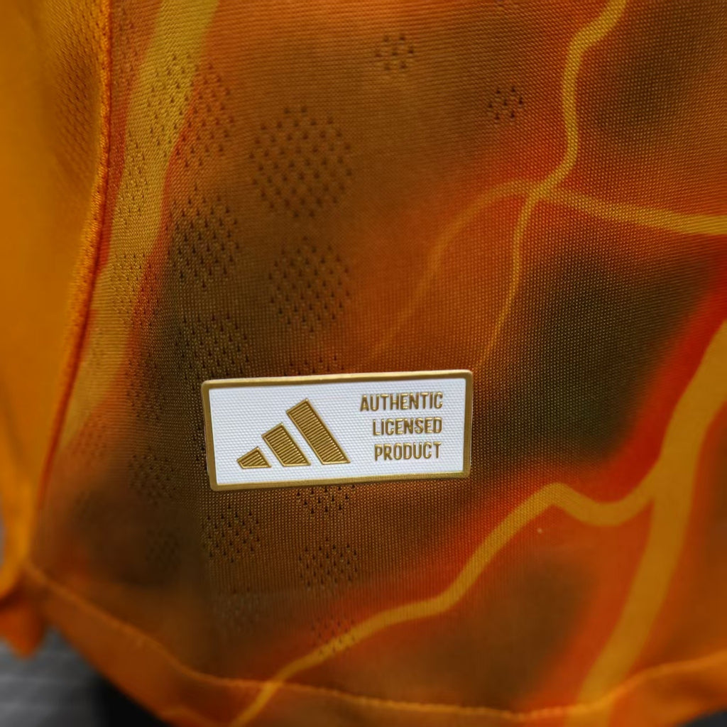 Orange jersey details with rectangular authenticity label
