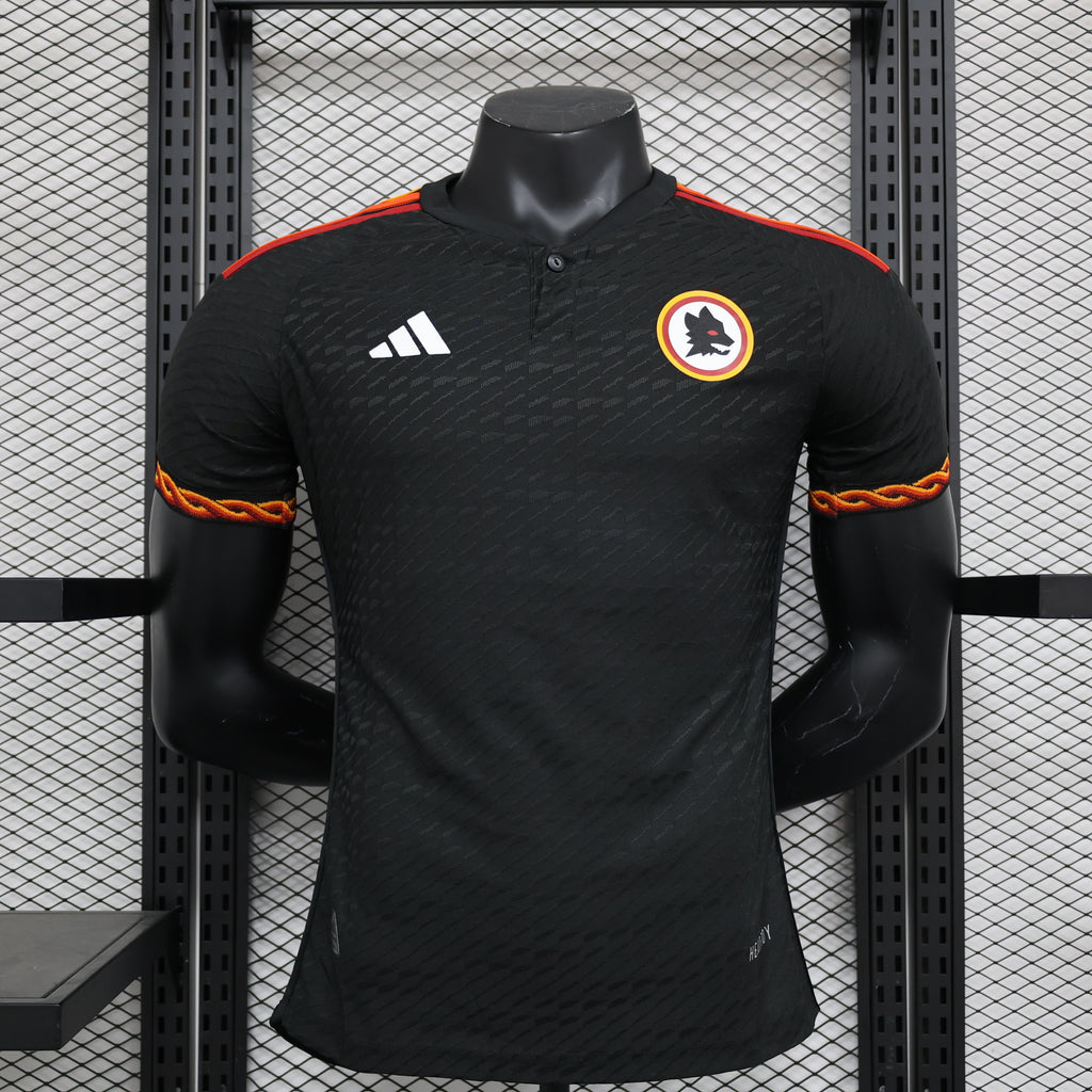 Roma third football jersey, black with red-orange trim and short sleeves