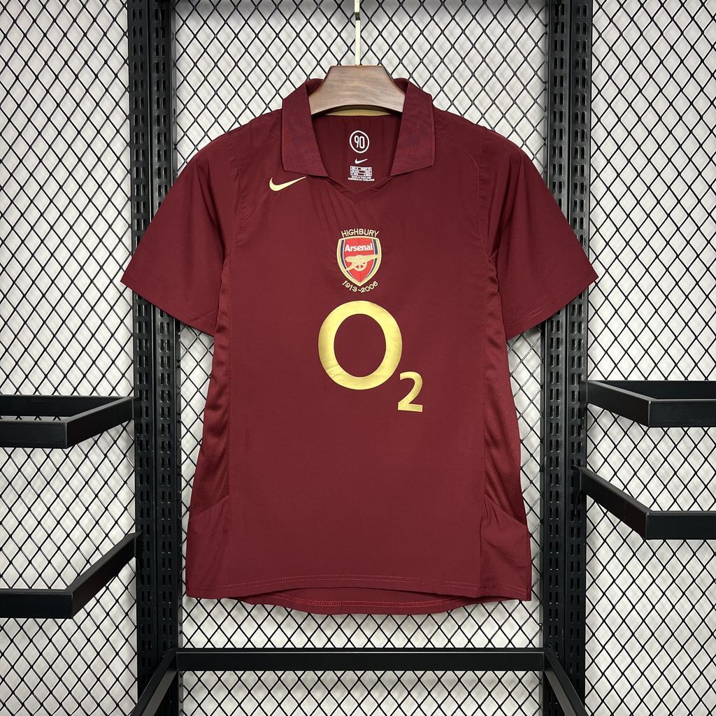 Maroon football jersey with gold O2 logo and Nike swoosh