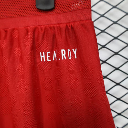 Red athletic shorts with HEAT.RDY text on the waistband
