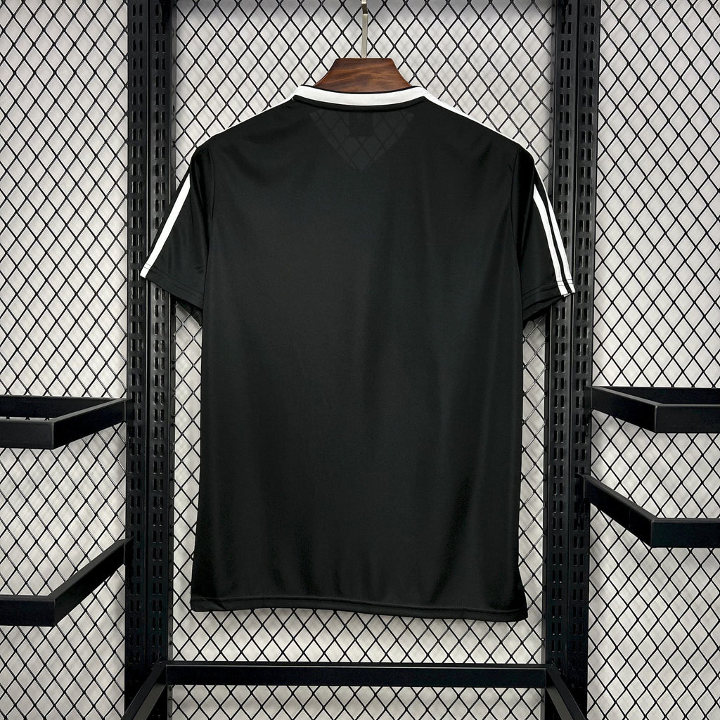 Black Colo-Colo away soccer jersey back view with white adidas shoulder stripes