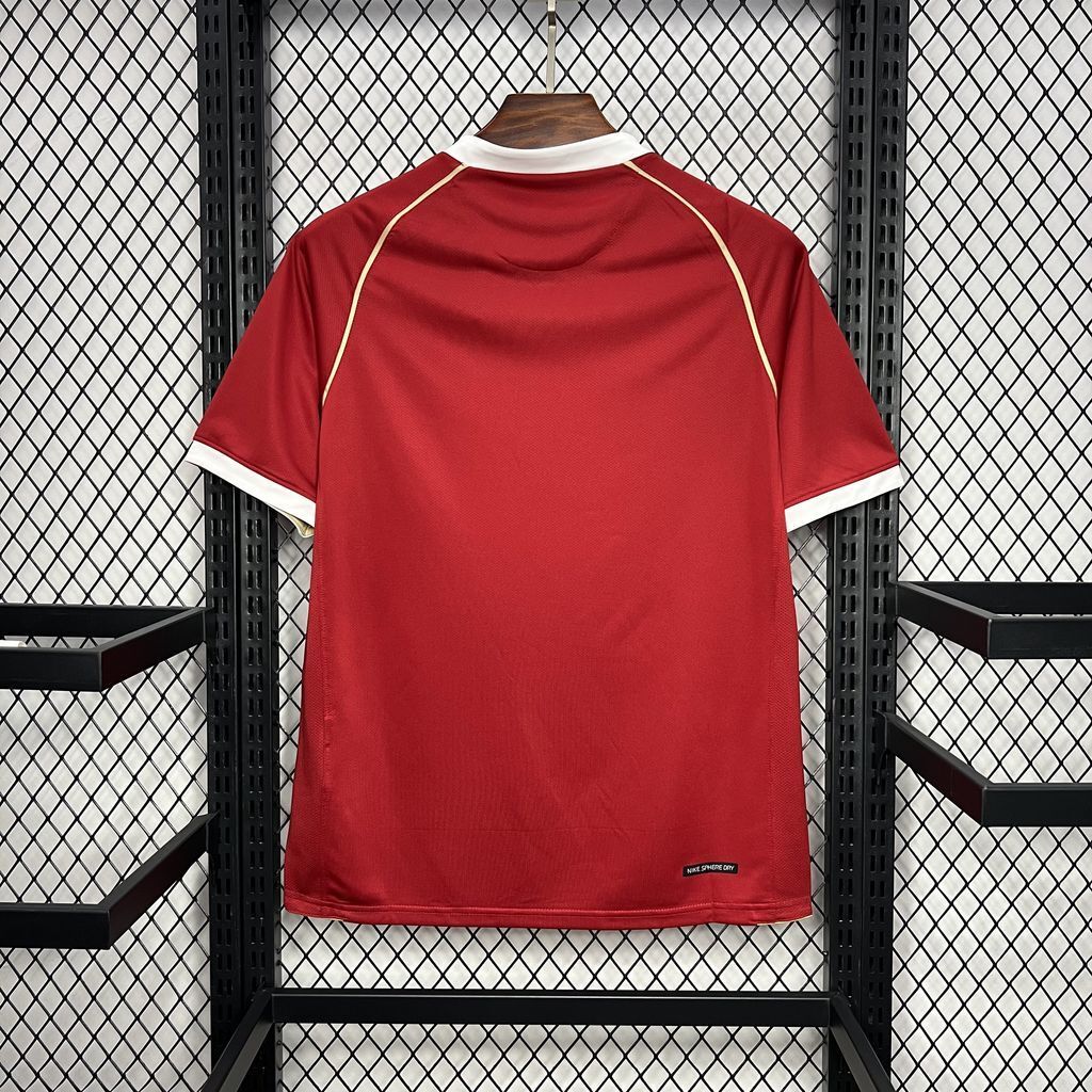 Red retro football jersey with white-trim V-neck and yellow side piping