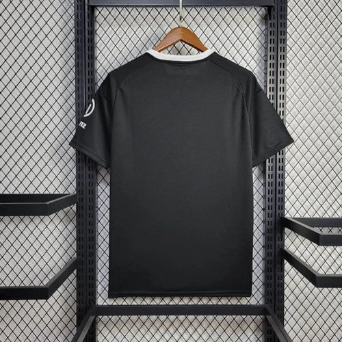 Black goalkeeper soccer jersey back view, crew neck, adidas logo on sleeve