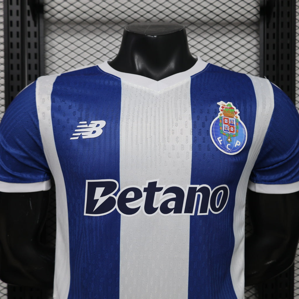 FC Porto home football jersey front with Betano sponsor and vertical blue-white stripes