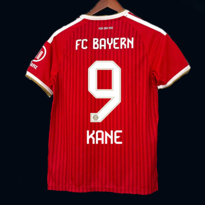 KANE 9 DAILY DEAL - Bayern Munich 2026/27 Home - Fan Version  with UCL Sleeve Patch