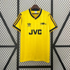 Yellow soccer jersey with black trim, JVC sponsor, adidas logo, short sleeves