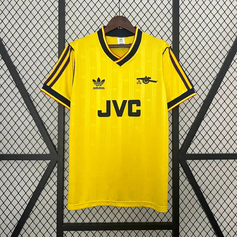 Yellow soccer jersey with black trim, JVC sponsor, adidas logo, short sleeves