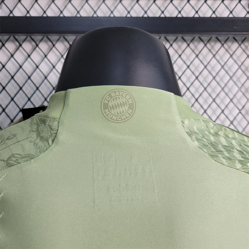 Oktoberfest player jersey close-up at back collar with FC Bayern Munich crest