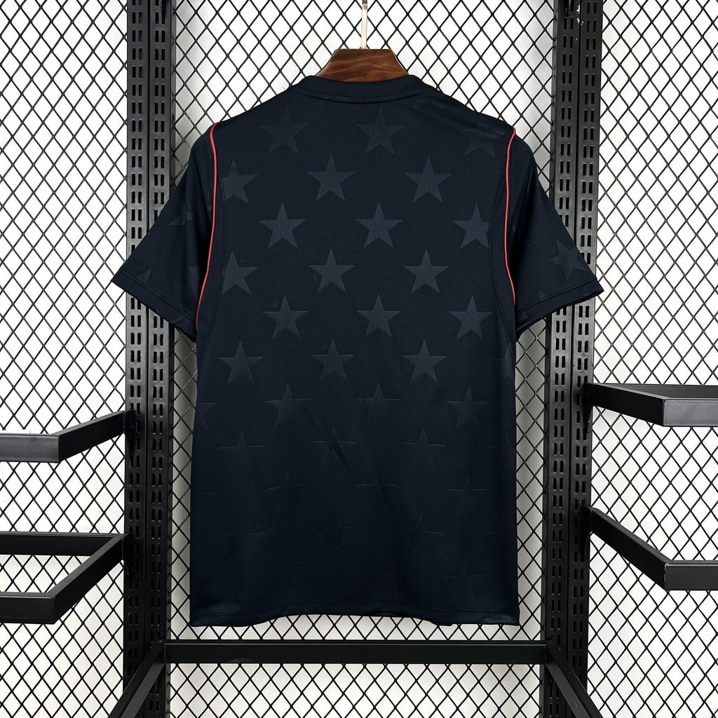 Navy USA 2026 away fan jersey back view with star graphic and red piping
