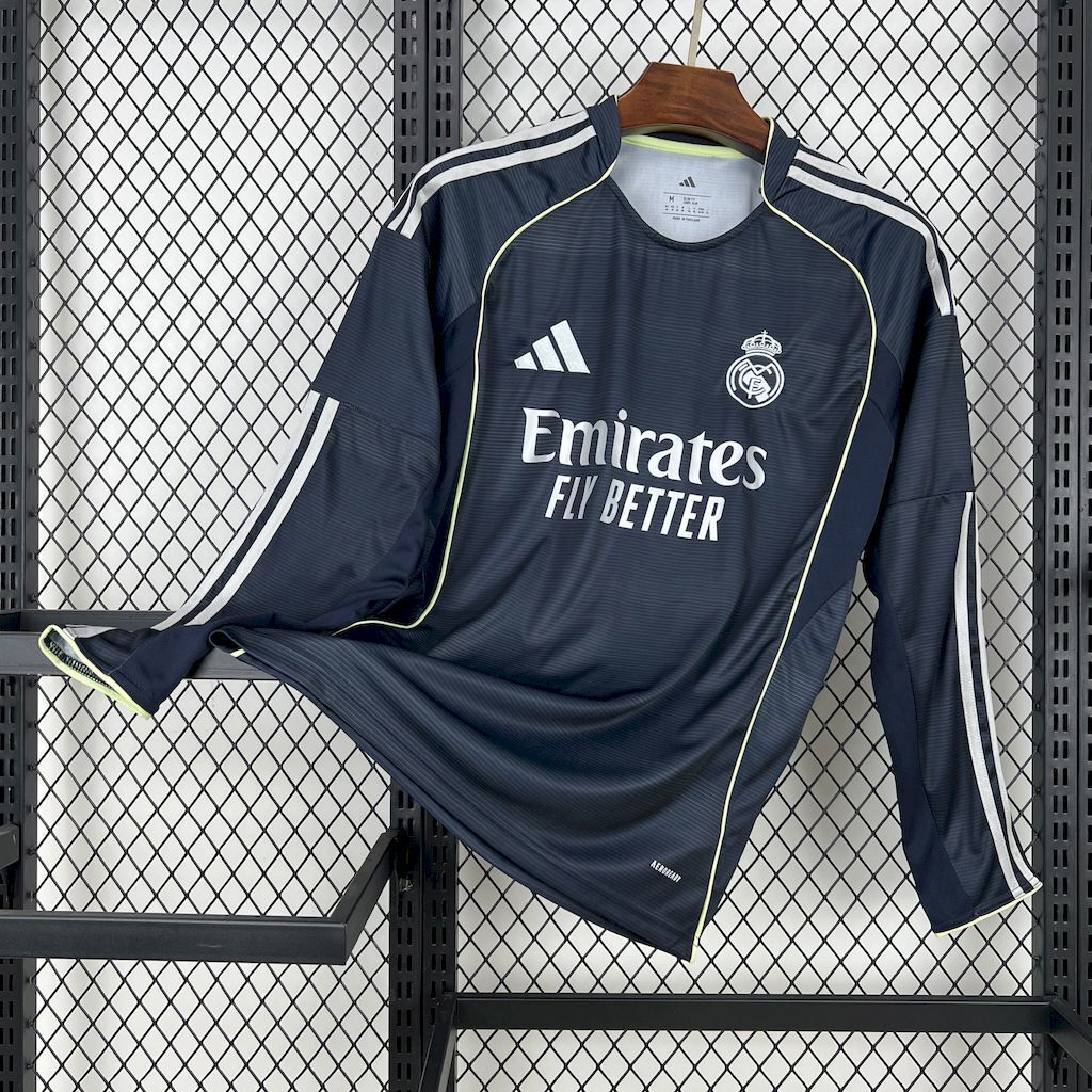 Dark navy long-sleeve football jersey with lime trim, crew neck, Real Madrid crest
