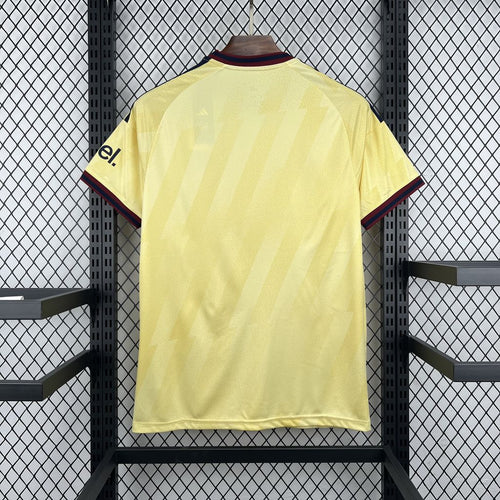 Yellow football shirt with navy-trim collar and short sleeves