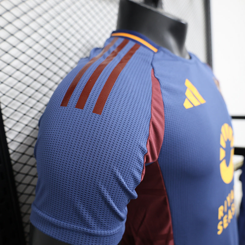 Blue jersey side view with maroon trim and adidas logo on upper arm