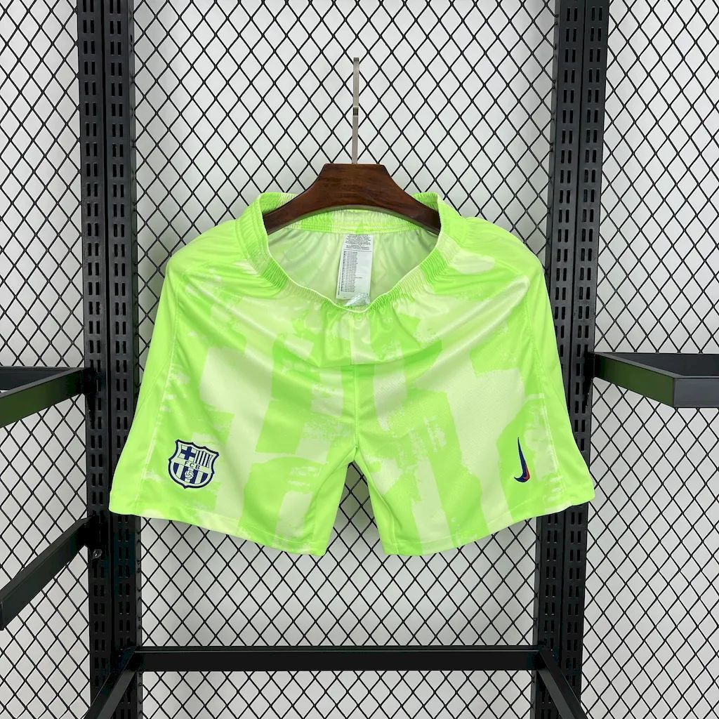 Neon lime football fan shorts with FCB crest and Nike swoosh on left leg.