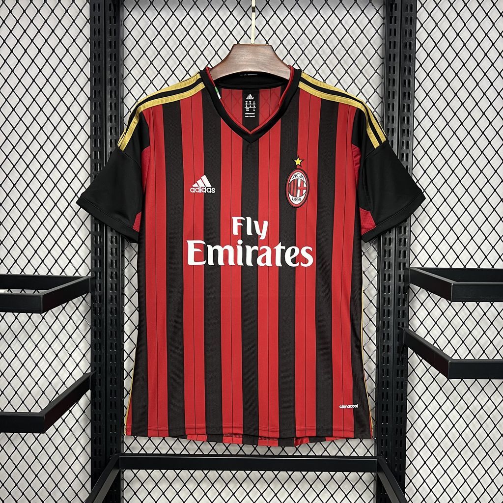 AC Milan home soccer jersey with red-and-black vertical stripes, Fly Emirates and club crest