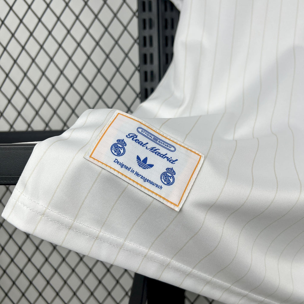 White Real Madrid jersey sleeve with embroidered sponsor patch