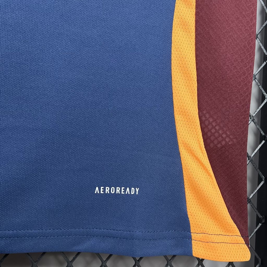 Close-up of blue jersey fabric with yellow side stripe and AEROREADY mark