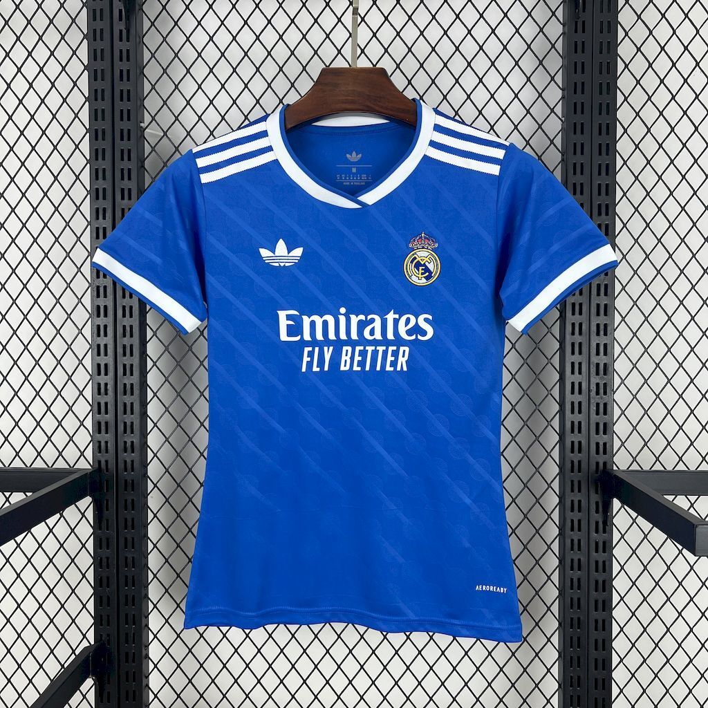 Blue women's soccer jersey with white collar trim and Emirates Fly Better sponsor