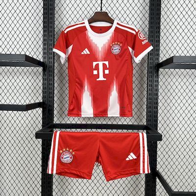 Kids Bayern Munich red home jersey and shorts set with white trim