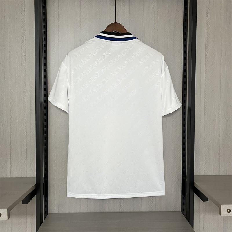 Retro away football jersey, plain white back view with short sleeves and crew collar
