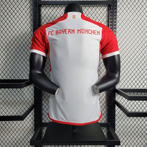 Home football jersey back on mannequin, red-and-white with FC Bayern Munchen lettering