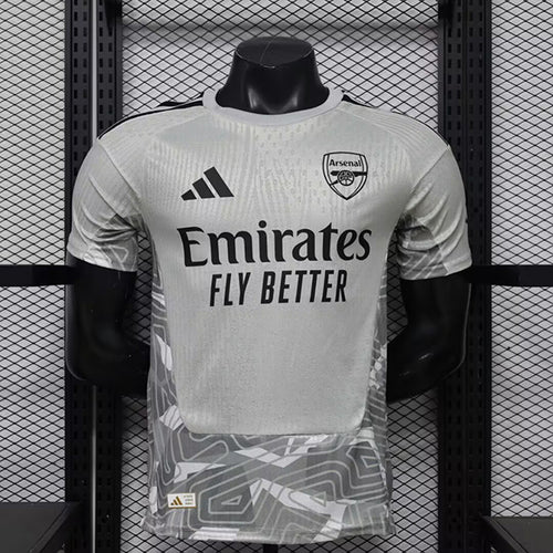 Grey goalkeeper football shirt on mannequin, adidas logo and Arsenal crest, Emirates Fly Better text