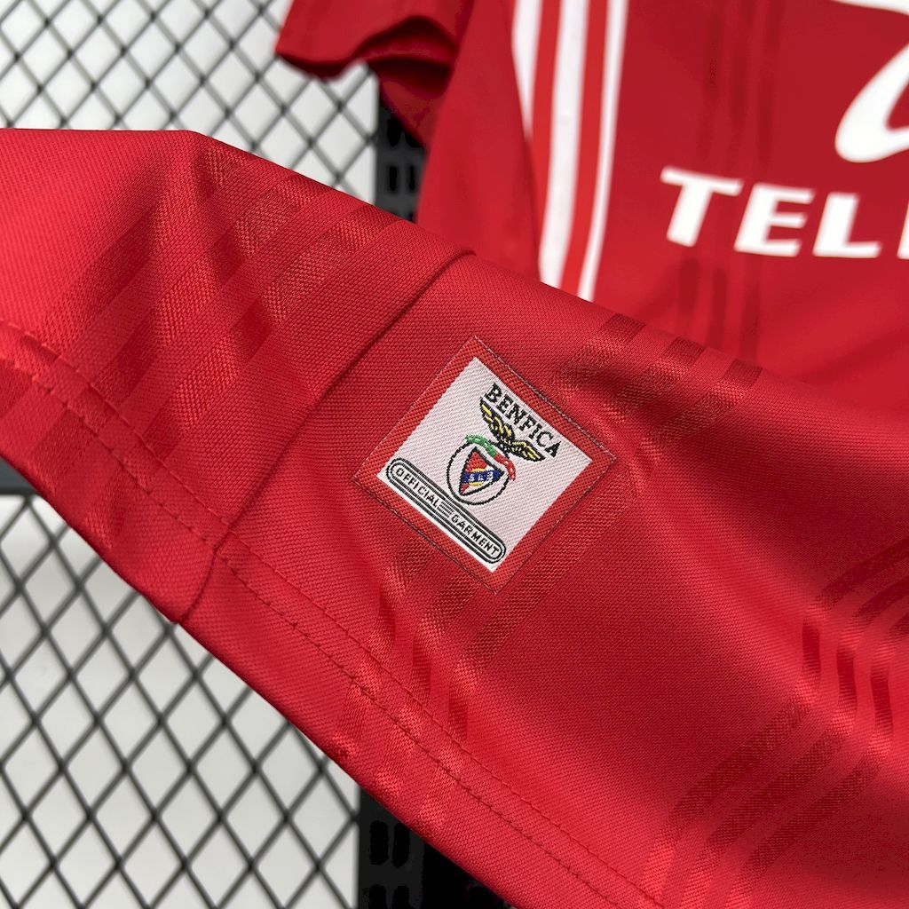 Red soccer jersey sleeve patch detail with Benfica insignia