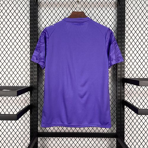 Purple goalkeeper fan jersey back view with short sleeves and raised collar