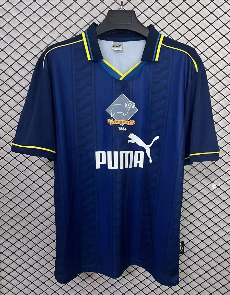 Blue retro away jersey with yellow trim, Puma logo, Derby County crest 1884