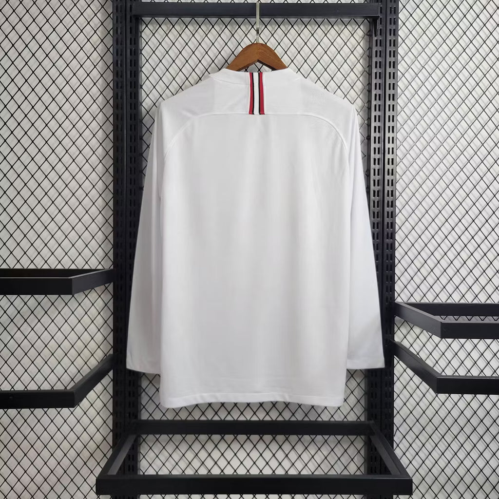 White PSG long-sleeve soccer jersey back view with vertical collar stripe