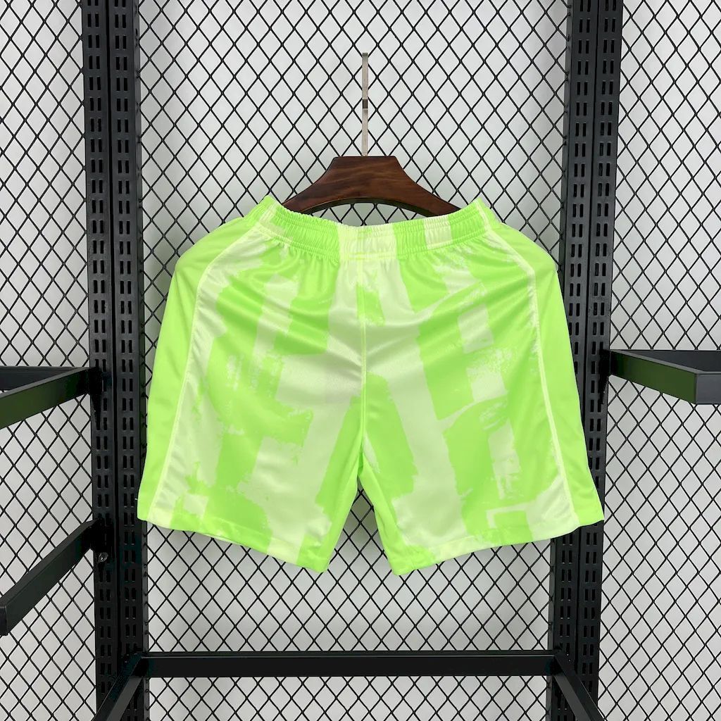 Neon lime football fan shorts with elastic waistband and back view.