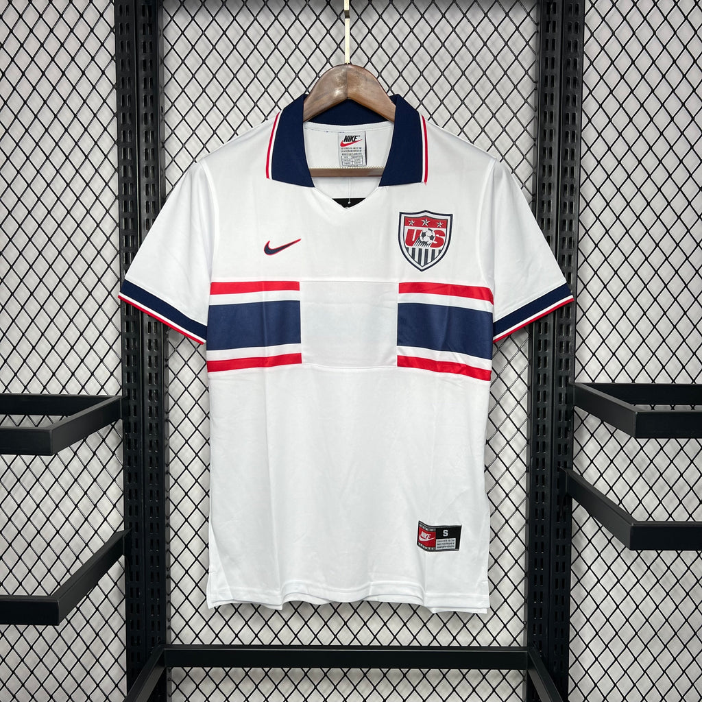 White USA retro soccer jersey with navy/red stripes, Nike swoosh and chest crest