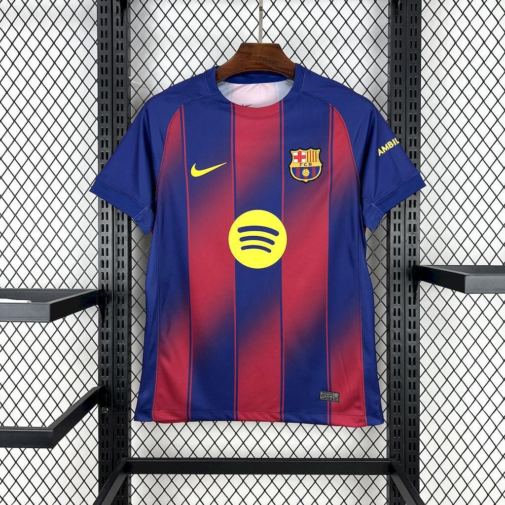 Barcelona home fan football jersey front view, blue with red vertical stripes and yellow sponsor