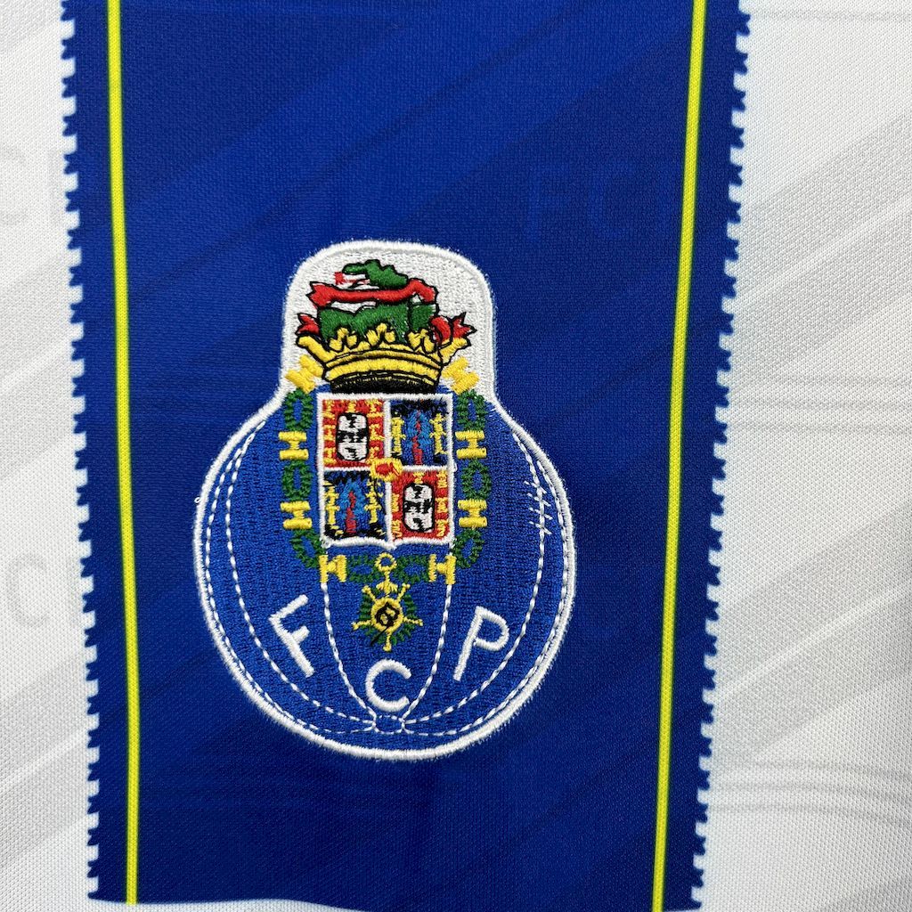 Retro home jersey close-up of FC Porto crest on deep blue panel