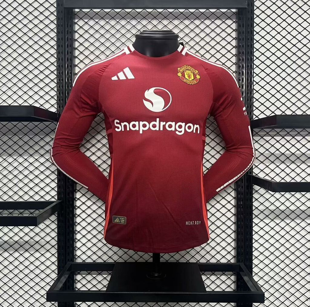 Home long-sleeve jersey in maroon, club crest, adidas logo, Snapdragon sponsor